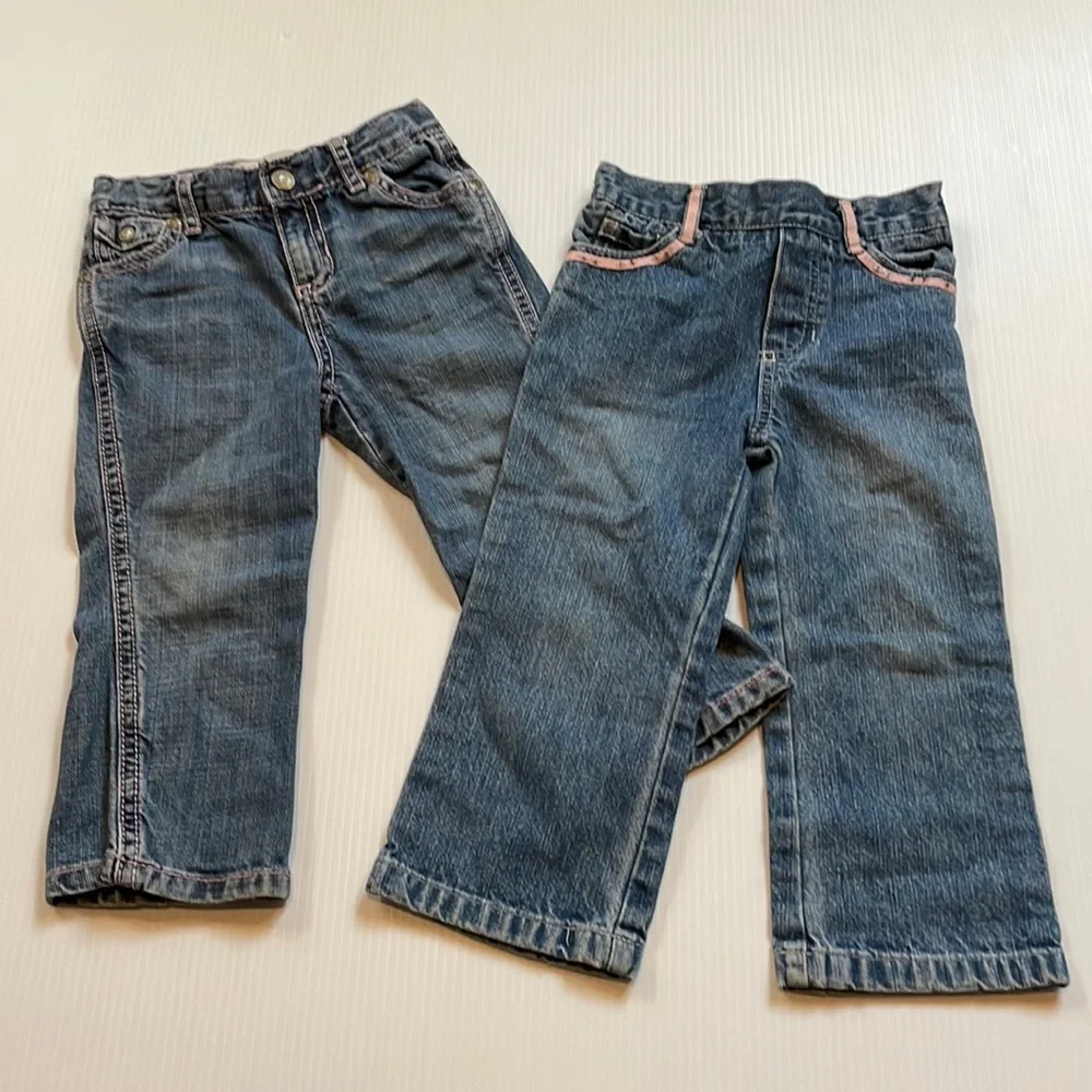 2 pair of toddler jeans, Old Navy & Kids Play. Pink details. Size 2T & 24 months
